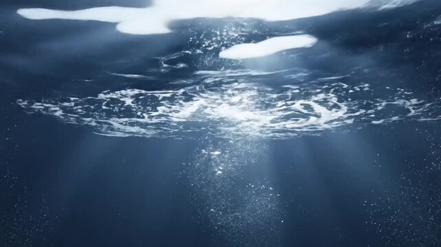 Sunlight Streaming Through Blue Water with Bubbles and Ripples Creates an Underwater Ambience Optimizing Light and Shadow in a Serene Setting For Adobe Stock