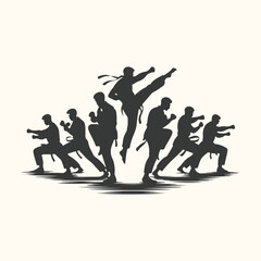 Silhouette of martial artists performing karate moves