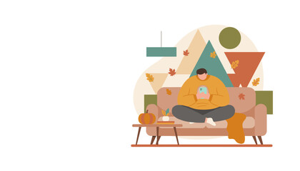 Man relaxing on a sofa browsing smartphone cozy autumn interior with leaves and pumpkin