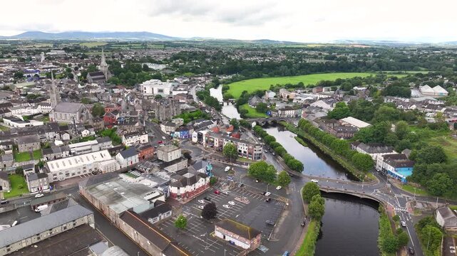 Drone view of Enniscorthy town on the river and cars ob the bridge. Ireland cityscape