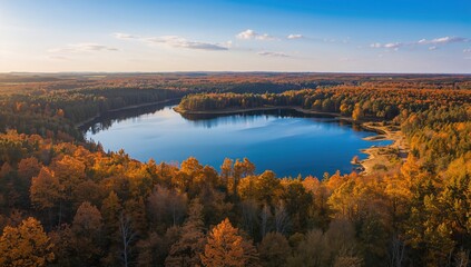Eco trail alongside blue lakes in a natural setting, emphasizing seasonal change