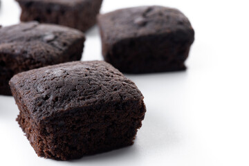 Homemade chocolate brownies isolated on white background. Copy space