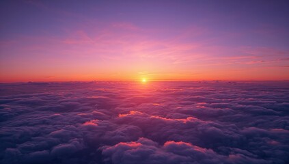 Stunning sunset seen from high above the clouds on a plane