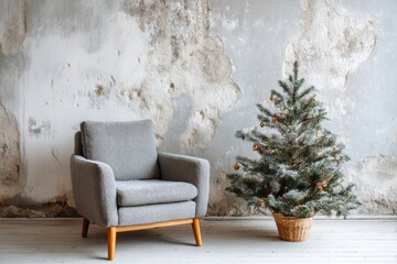 Cozy contemporary armchair sits beside a small decorated evergreen tree in a rustic room