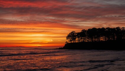 Sunset Colors Blaze Across the Ocean and Island Horizon