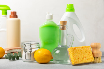 Eco cleaning.Cleaning products on a textured background. Eco-friendly home cleaning. A bottle of...