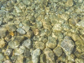 Ocean stones in transparent water
