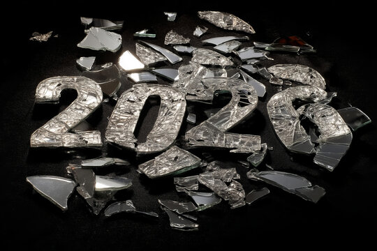 Shattered reflective numbers heralding 2026, spanning New Year's intrigue and reflective fragments of time during Oatmeal Monday