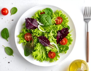 Overhead view of a fresh, vibrant salad on a white plate with cherry tomatoes