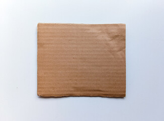 Isolated Cardboard Piece on white background. This Corrugated Cardboard Piece is perfect for...
