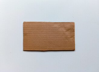 Isolated Cardboard Piece on a clean white background. This Corrugated Cardboard Piece is ideal for...