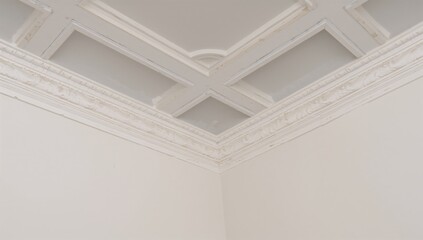 Obraz premium Detail of ornate crown molding at a room's corner, showcasing intricate design in suspended ceiling and drywall construction