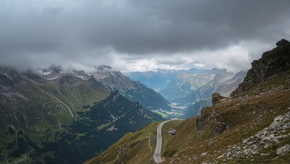 Obraz premium Scenic vistas along a trail in the Swiss Alps under a misty sky, highlighting seasonal change