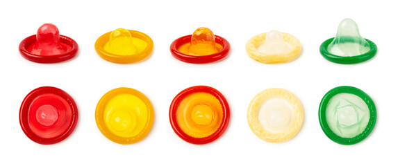 Condoms isolated on white background. Colorful fruit-colored condoms in packaging. Safe sex concept. Contraceptive. Different birth control methods. Aids prevention. World AIDS Day. Sexual health.