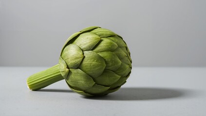 Fototapeta premium Artichoke on a neutral backdrop, fiber-dense choice