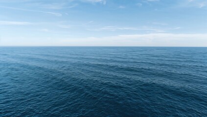 Fototapeta premium Gentle waves on the ocean's azure surface, seasonal change