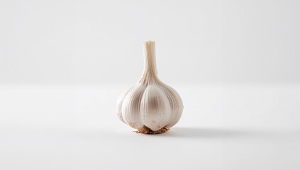Garlic bulb on a white surface, rich in flavor, healthy ingredient for cooking