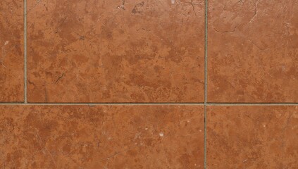 Fototapeta premium Scratched surface of brown cement tiles as a textured stone wall backdrop