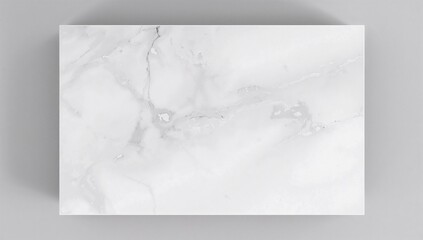 Cosmetic display stand made of white marble for showcasing beauty products, viewed from above with space for text.