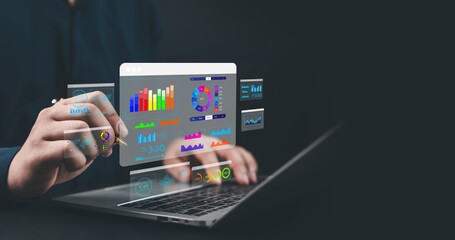 Businessman analyzing digital data dashboard on laptop, displaying colorful charts, graphs, and analytics interface for marketing performance, financial growth, business management, and strategic