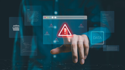 Data protection and cybersecurity system warning alert. Business hand touching a holographic...