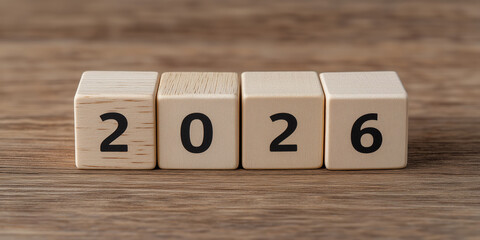 Wooden Blocks Displaying Number 2026 on a Wooden Surface