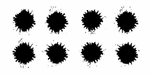 Collection of eight black ink splatter brush strokes on a white background
