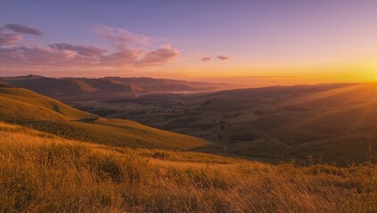 Fototapeta premium Dusk lighting up the golden slopes