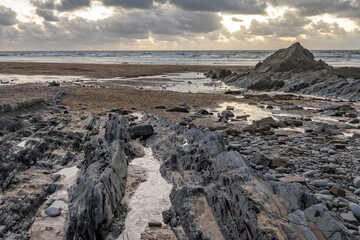 After sunset light on Cornish beach at low tide