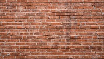 Naklejka premium Rugged brick wall texture, ideal for editorial header background