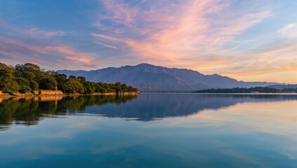 Fototapeta premium Twilight scene of a mountain and lake water at a scenic lake