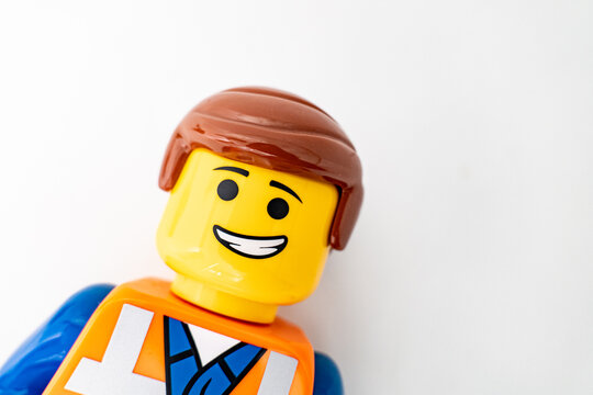 Bradford, UK Oct 30 2025 - Lego Emmet plastic toy shot close up on a white background.