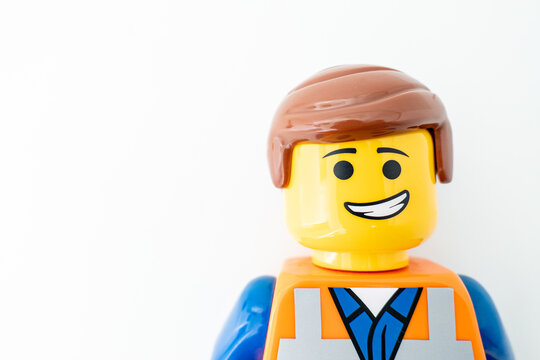 Bradford, UK Oct 30 2025 - Lego Emmet plastic toy shot close up on a white background.