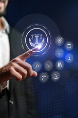 Legal technology in action as a man interacts with a digital interface showing law symbols