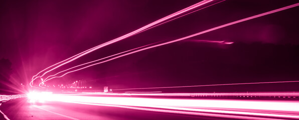 violet car lights at night. long exposure