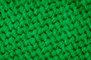 green braided material with an interesting pattern