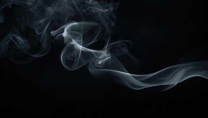 Obraz premium Blurred smoke against a dark backdrop, creating an abstract atmosphere