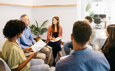 Diverse startup team collaborating during an office meeting