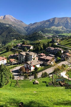 View of Oltre il Colle Montain Village from a Mountain Path During a Sunny Summer Day. Italian Alps