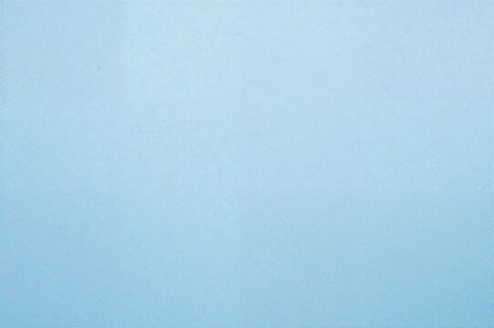 Satin silk cloth with a light blue textured fabric pattern background