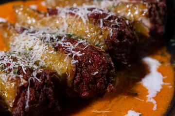 Pork Stuffed Peppers With Tomato Sauce