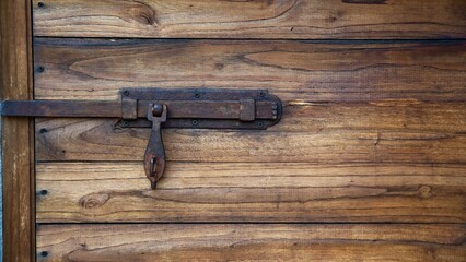 Close-Up of Lock on Wooden Door &mdash; Security and Rustic Concept