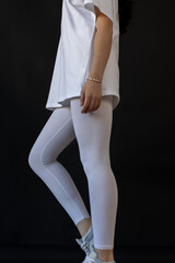 Model wearing white leggings highlighting shape, Mockup presenting waist and overall contour clearly
