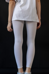 Model wearing white leggings highlighting shape, Mockup presenting waist and overall contour clearly