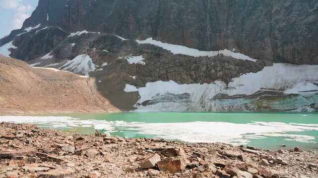 Edith Cavell Lake in Jasper National Park, surrounded by majestic mountains and glaciers