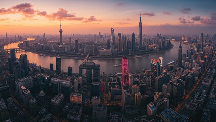 Naklejka premium Wide-angle view of a cityscape along a river at twilight