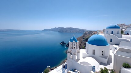 Fototapeta premium Santorini Vista: Captivating coastal scene showcases iconic blue-domed churches nestled amidst pristine whitewashed buildings, overlooking the Aegean Sea's sapphire expanse on a bright day.