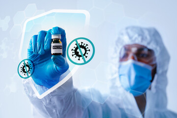 Healthcare professional holds vaccine vial while illustrating protection against virus