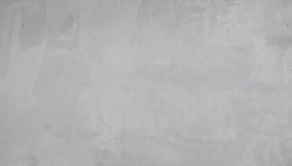 Naklejka premium A smooth gray backdrop featuring delicate uneven textures and light linear marks, mimicking a natural concrete or plaster finish with minor flaws.