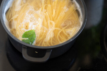 cooking, spaghetti in pot, boiling